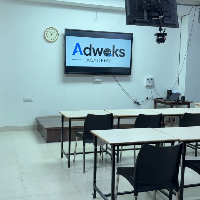 Smart classroom with Adwoks Academy logo on screen for IT training in Jaipur